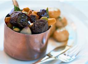Venison ragout with minted new potatoes & vegetables